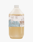 A 5-litre bottle of La-Eva spice hand and body wash with a label featuring Emma Cassi artwork and the brand name LA EVA. Spicy wash; ginger, patchouli, cannelle