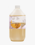 A 5-litre bottle of La-Eva Phos hand and body lotion with a label featuring Emma Cassi artwork and the brand name LA EVA.