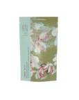A package of La-Eva Linden Exfoliant & Bath Salts with a label featuring artwork "Bleached" by Valeska Hykel