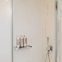Selection of three La-Eva 200ml aluminium bottles - Roseum face and body wash, Spice shampoo, Spice conditioner 
