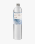 A tall, slender aluminium bottle of Blü Hand & Body lotion sustainable refill. Label featuring Rose-Marie Caldicott artwork.