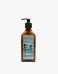La Eva x Meinke Flesseman "Summer Swimmers" original artwork on label Blu face and body wash in an amber glass pump bottle