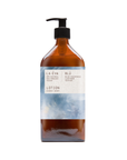 La Eva x Rose-Marie Caldicott Blu hand and body lotion in an amber glass pump bottle