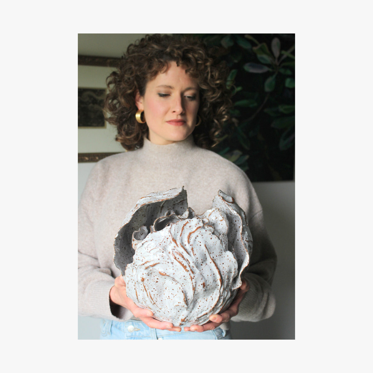 La Eva x Katie-Coston holding original artwork "anthos" for jasmina