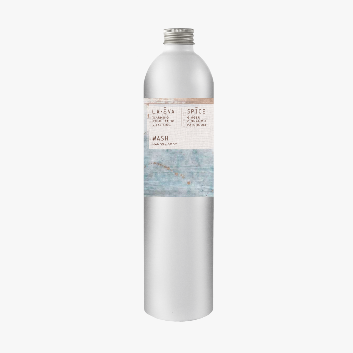A tall, slender aluminium bottle of spicey Hand & Body Wash sustainable refill. Label featuring Emma Cassi artwork.