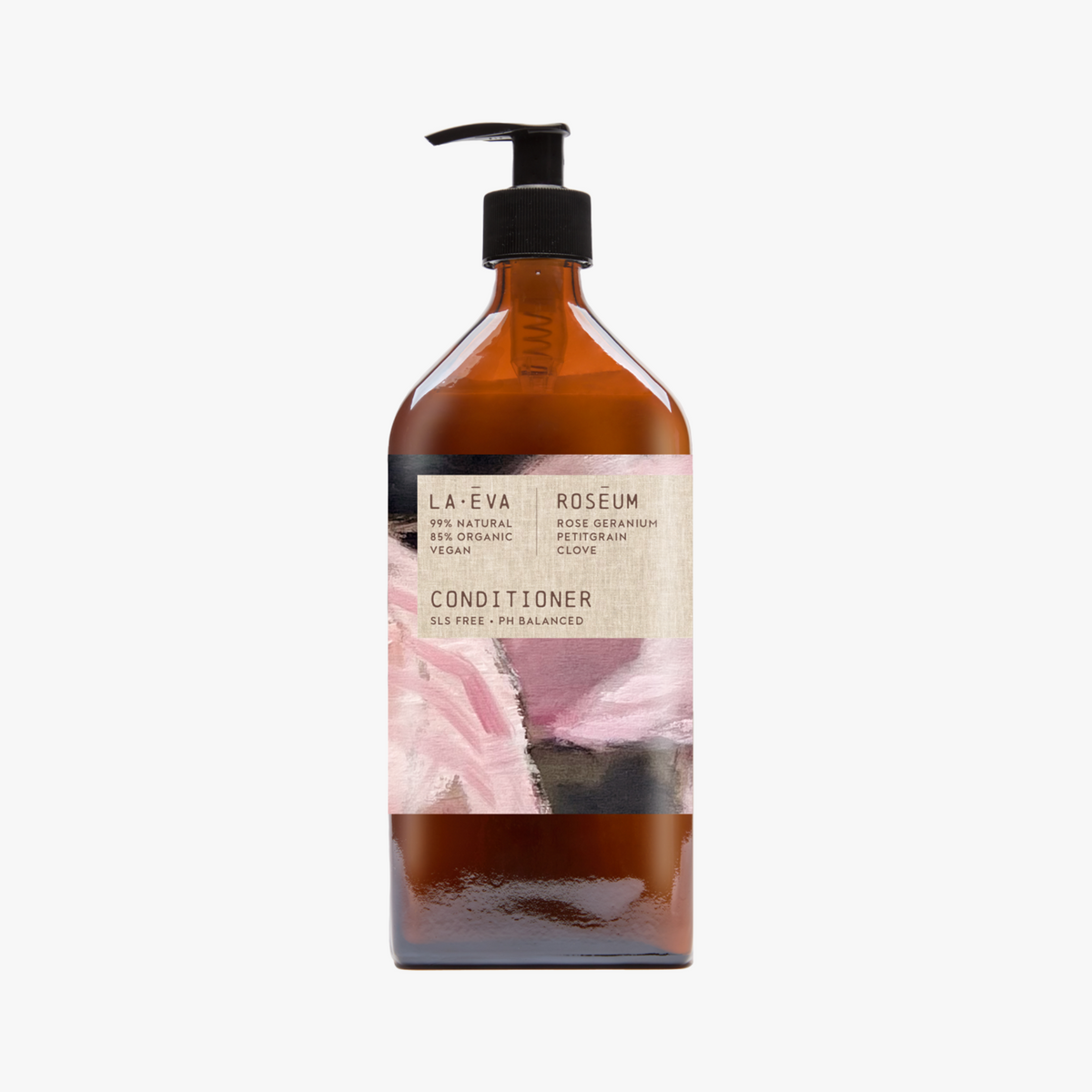 A recycled amber glass pump bottle of Roseum Conditioner with a label featuring 'Flamingos' artwork by Meinke Flessemen and the text 'roséum' part of the rose geranium botanical, Pelargonium roseum.