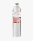 A tall, slender aluminium bottle of Roseum hand and body wash sustainable refill. Label featuring Meinke Flessemen artwork.