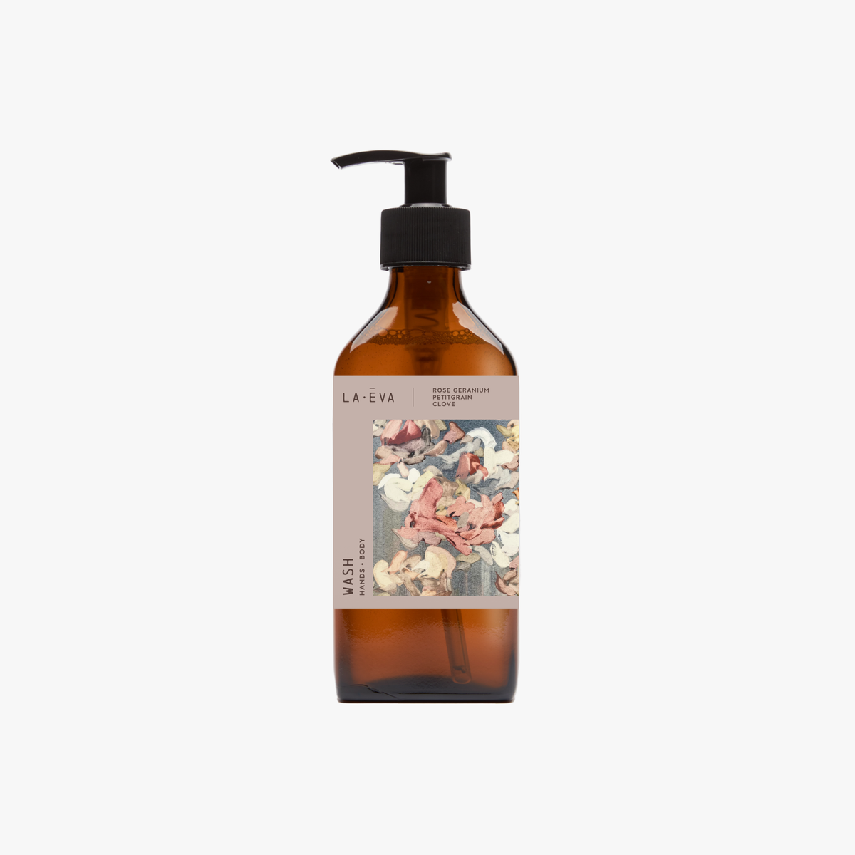 A recycled amber glass pump bottle of La-eva Roseum Hand & Body wash with a label featuring 'Younger Together' artwork by Valeska Hykel and the text 'roséum ', part of the rose geranium botanical, Pelargonium roseum.