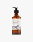 A bottle of Jasmina Universal Oil with a pump dispenser, set against a plain background.