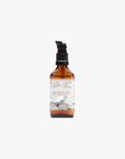 A bottle of Jasmina Universal Oil with a pump dispenser, set against a plain background.
