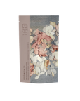 A package of La-Eva Roseum Exfoliant & Bath Salts with a label featuring artwork "Younger Together" by Valeska Hykel