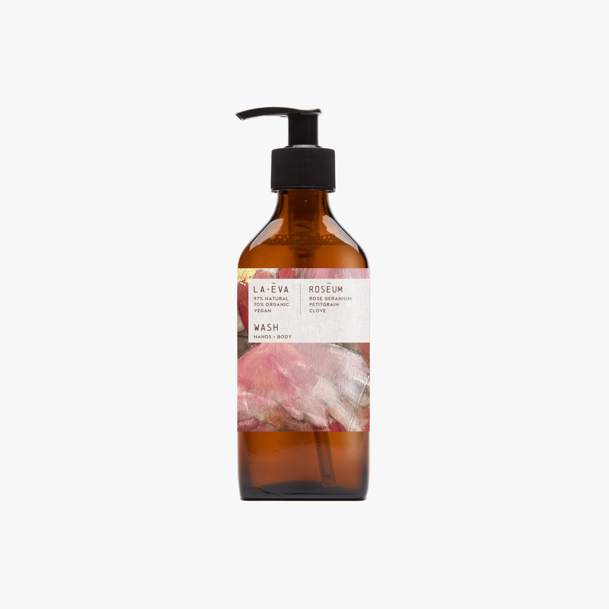 A pump bottle of Roseum Hand & Body Wash with a label featuring 'Flamingos' artwork by Meinke Flessemen and the text 'roséum' part of the rose geranium botanical, Pelargonium roseum.