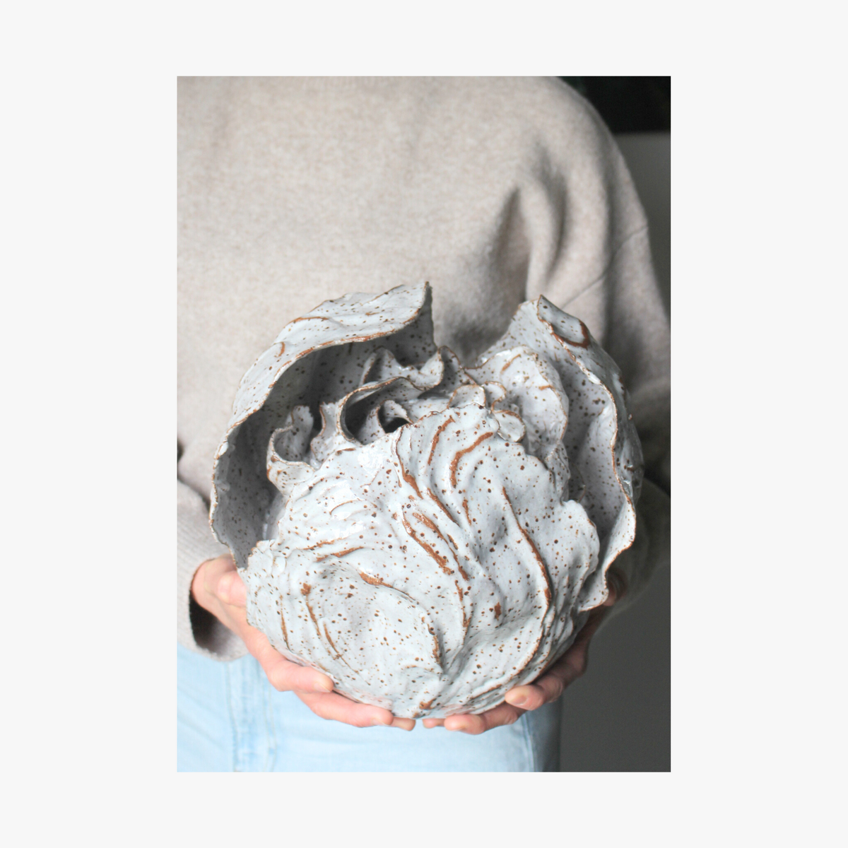La Eva x Katie-Coston holding original artwork "anthos"
