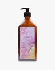 La Eva x Nathalie Moisy hand and body lotion in an amber glass 500ml pump bottle